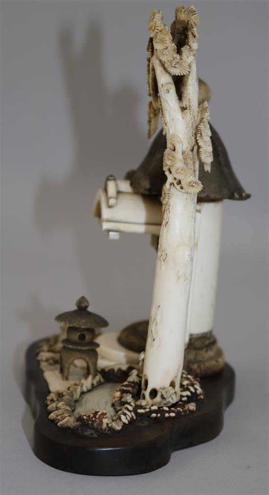 A Japanese ivory and bone model of a garden shrine, height 18.5cm